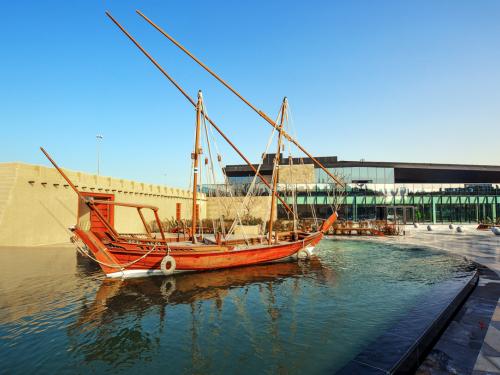 Wooden boat in a water basin